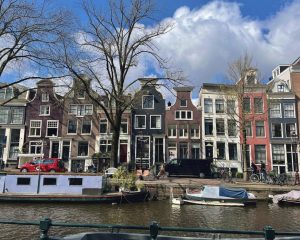 Just one of the many canals with cool houses. Fun fact, there are a lot of houses and buildings that are leaning forward or to the side because the structure under water had deteriorated a bit!