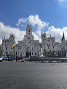 One of the main government buildings, featuring some flags in support of Ukraine.