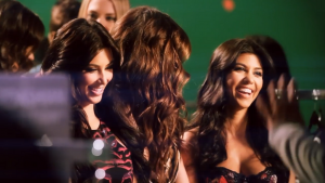 Showing two women - Kardashian sisters - smiling